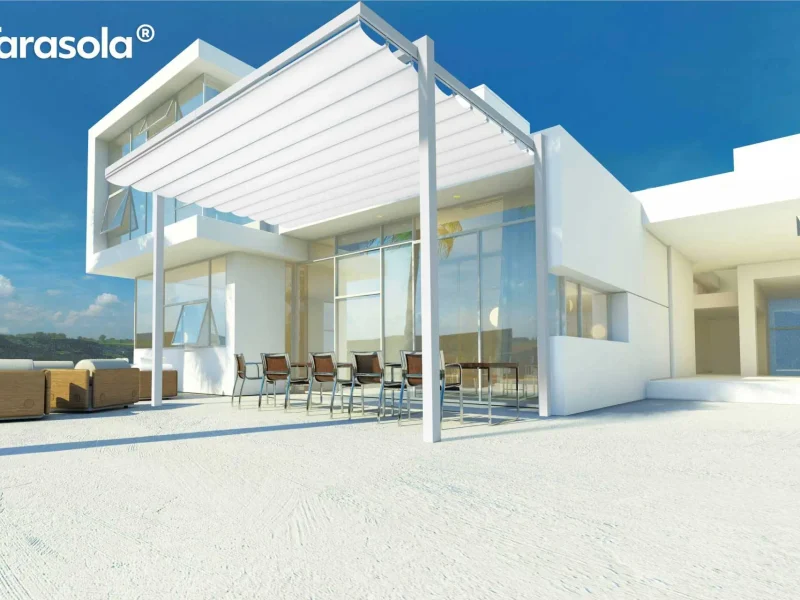 Weißes Haus mit einer weißen Überdachung, blauer Himmel